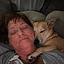 Bonnie And Clyde is registered to the contest to win money with this photo: woman, dog, sleeping, couch, indoor, cozy, affection, pet, snuggling, paw, portrait, casual, relaxation, companion, comfort, closeup, blanket, clothing, home, resting
