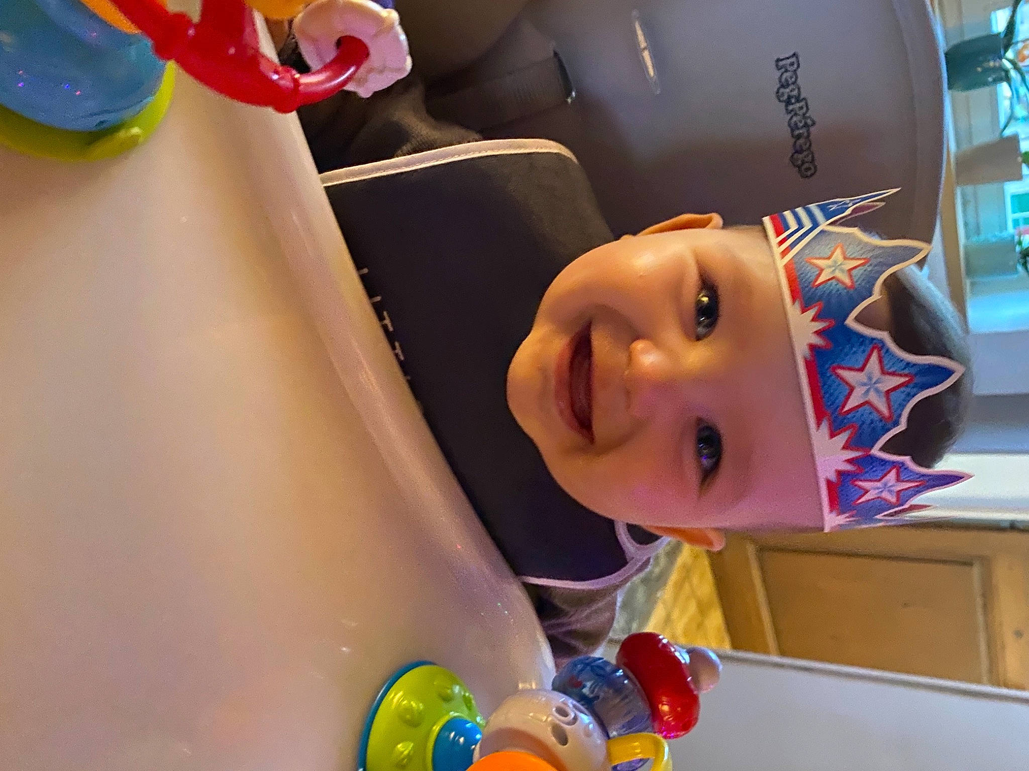 Maxence participe au concours pour gagner de l'argent avec cette photo : baby, baby_playing_with_toys, baby_products, baby_toddler_clothing, baby_toys, colorfulness, cylinder, facial_expression, headwear, joy, laugh, party_supply, person, plastic, play, riding_toy, toddler, toy, yellow