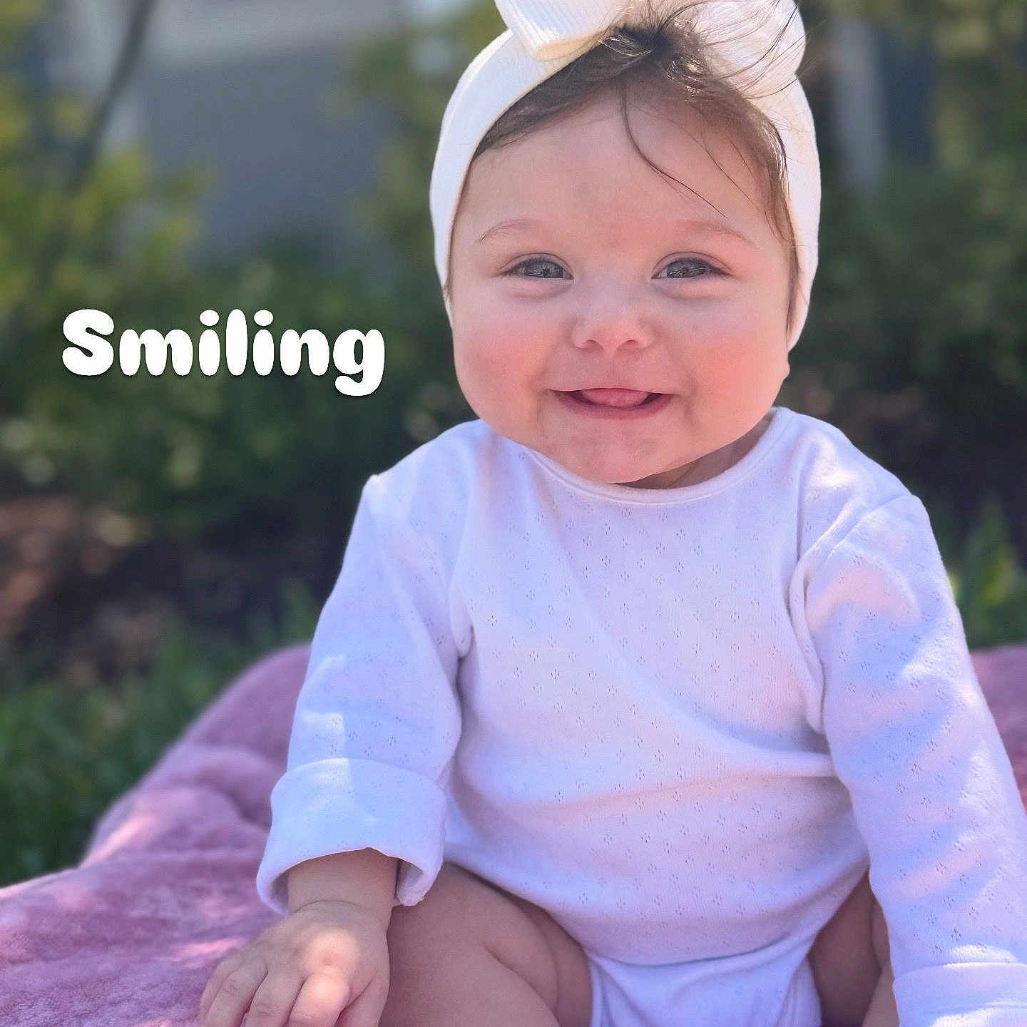 Amera Kaleel joined the competition — help win amazing prizes! accessories, baby, babylaughing, bodypart, clothing, face, finger, hand, happy, hat, head, headband, laughing, person, photography, portrait, purple, sitting, smile, t_shirt