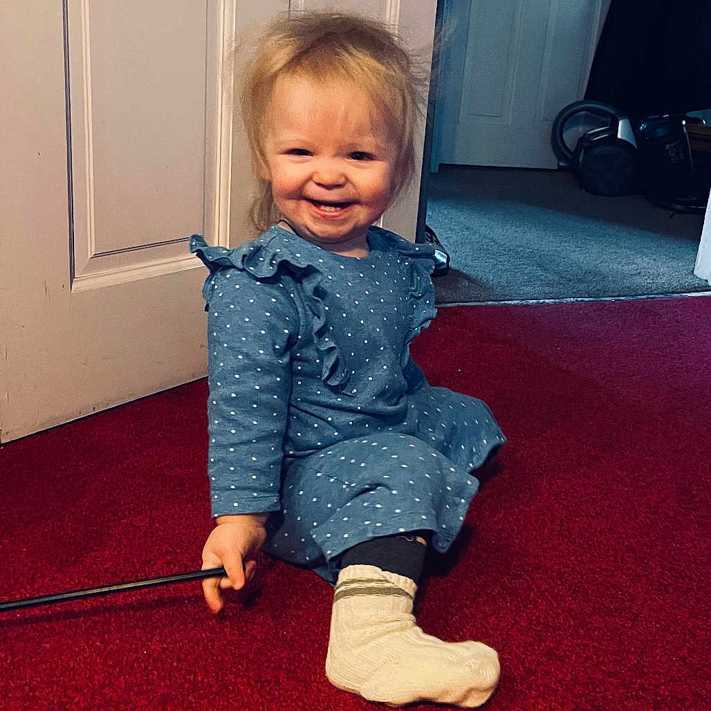 Elene Sofia joined the competition — help win amazing prizes! baby, clothing, coat, door, dress, electronics, face, footwear, happy, head, hosiery, jacket, jeans, pants, person, photography, portrait, shoe, sitting, sock