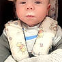 baby, infant, car_seat, harness, blanket, winnie_the_pooh, child, seat_belt, cute, face, clothing, sweater, closeup, car, seat, safety, child_safety, expression, indoor, young