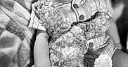 Angelo joined the competition — help win amazing prizes! baby, black_and_white, blanket, bunny, buttoned_shirt, child, clothing, cozy, cute, face, happy, indoor, infant, person, portrait, sitting, smile, soft_texture, stuffed_animal, toy