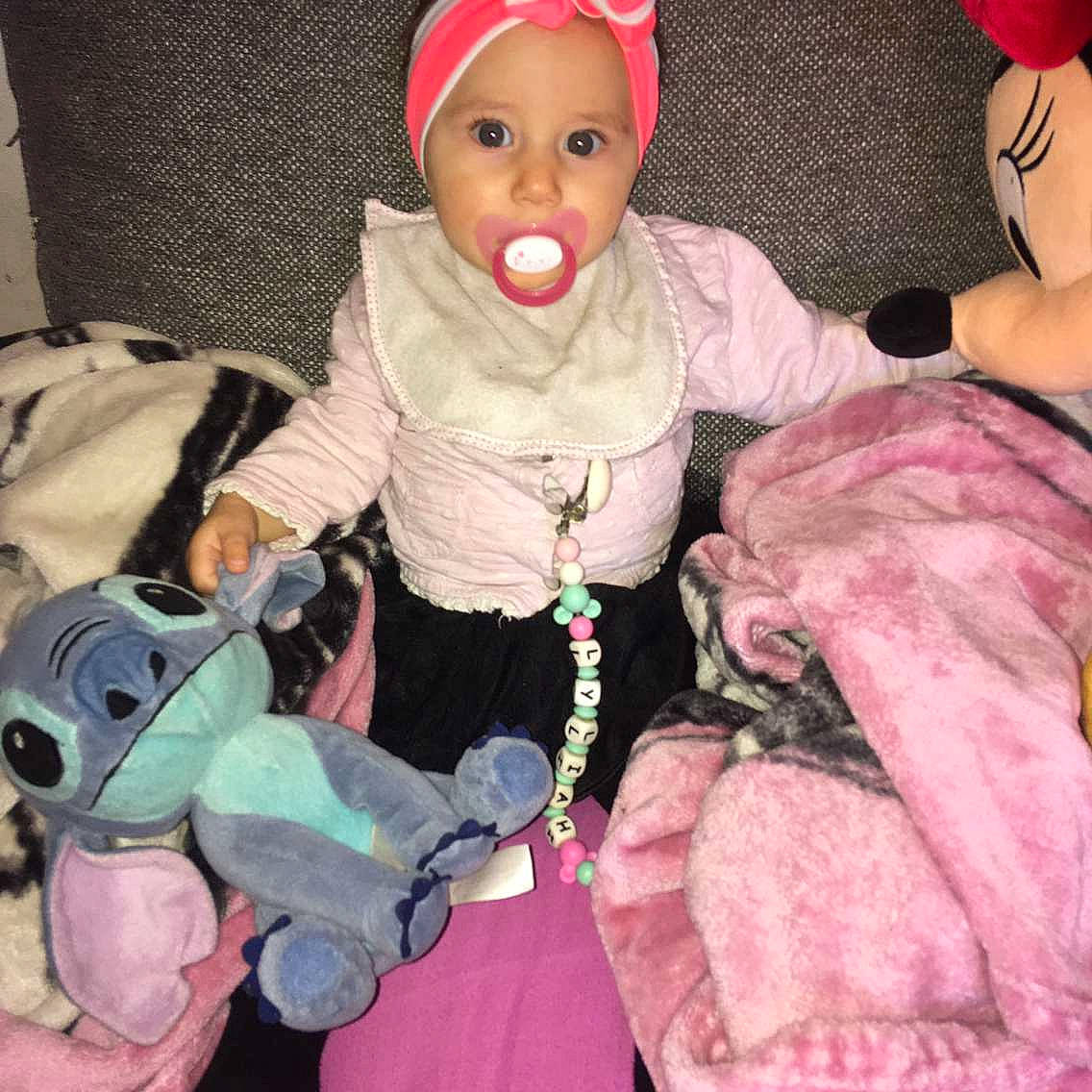 Lyliah participe au concours pour gagner de l'argent avec cette photo : baby, baby_products, baby_sleeping, baby_toddler_clothing, cap, cheek, child, comfort, costume_hat, eye, happy, head, headwear, human_body, knit_cap, lap, mouth, person, pink, skin