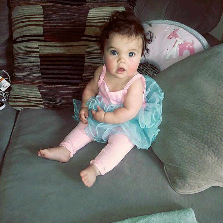 Anora joined the competition — help win amazing prizes! baby, child, eye, furniture, leg, person, sitting, skin, smile, toddler
