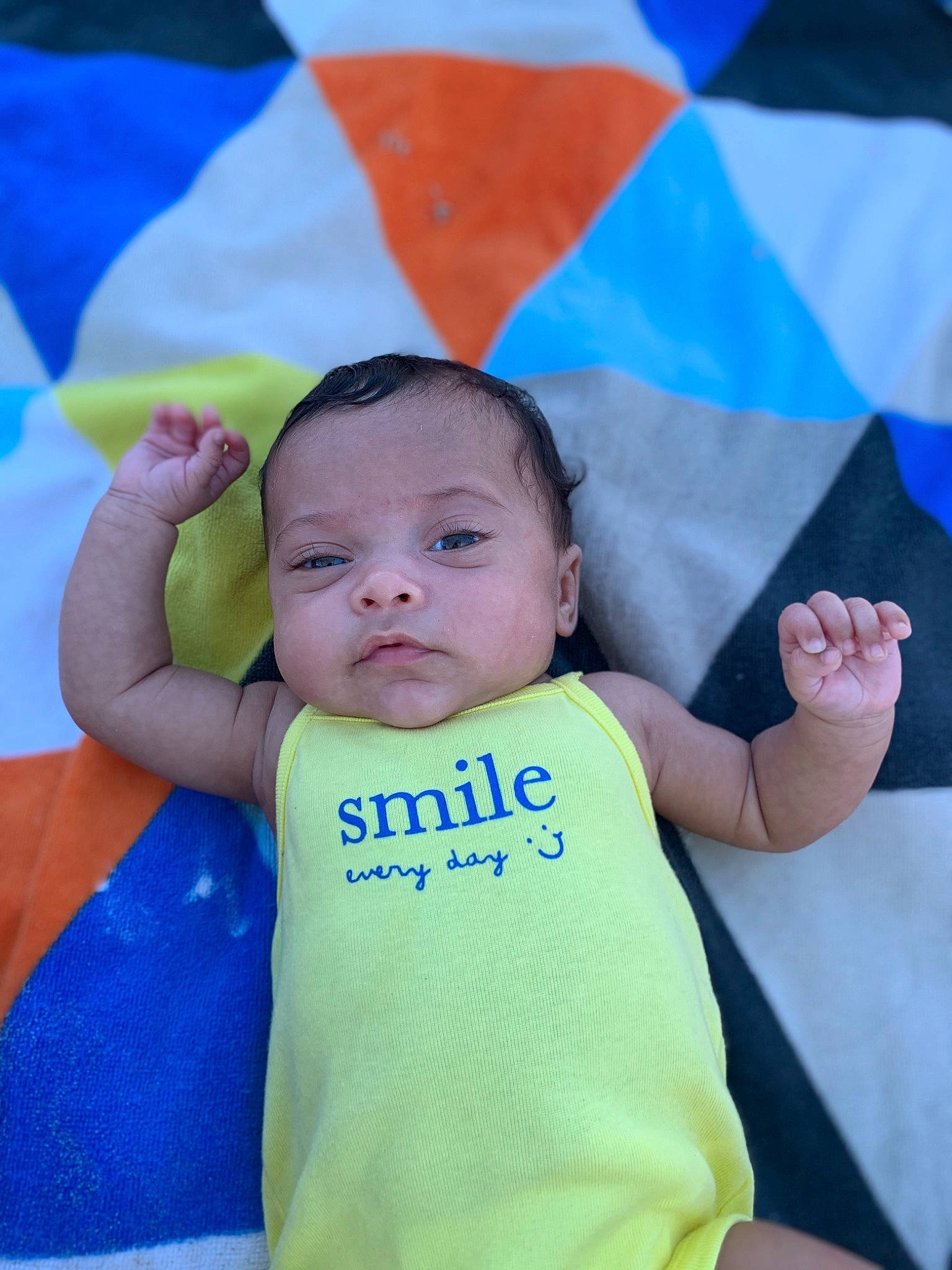 Kanary is registered to the contest to win money with this photo: baby, blue, child, eye, fun, hand, happy, leisure, person, skin, smile, toddler, vacation, world, yellow