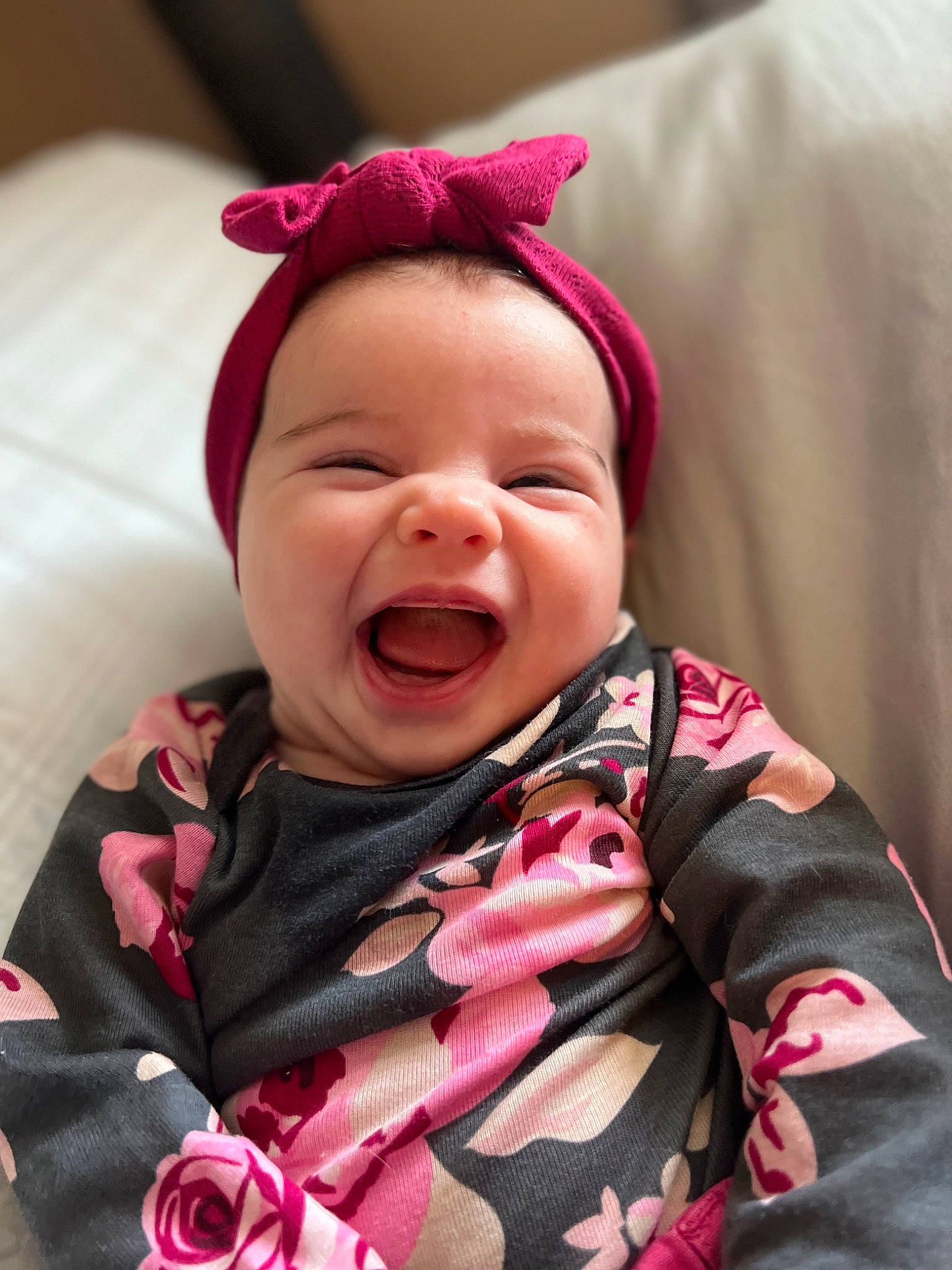 Harleigh is registered to the contest to win money with this photo: baby, baby_toddler_clothing, cheek, chin, comfort, eyebrow, face, happy, iris, lip, mouth, nose, person, pink, red, skin, sleeve, smile, textile, toddler