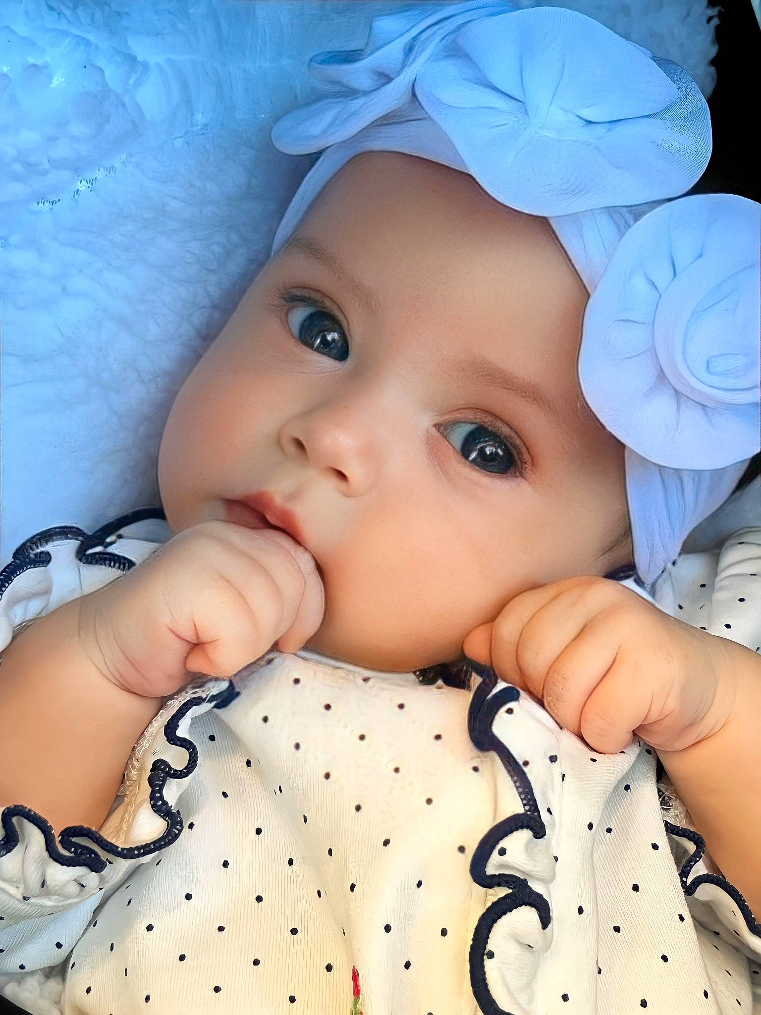 Josephine is registered to the contest to win money with this photo: baby, baby_toddler_clothing, cheek, chin, eye, eyebrow, eyelash, face, facial_expression, hairstyle, hand, head, headwear, human, lip, mouth, nose, organ, person, skin