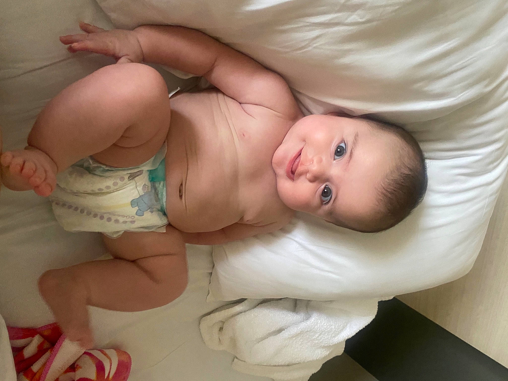 Jaylynn is registered to the contest to win money with this photo: arm, baby, cheek, chest, chin, comfort, diaper, eye, eyebrow, facial_expression, finger, hand, head, human_body, joy, mouth, neck, person, product, skin
