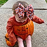 Hazel joined the competition — help win amazing prizes! asphalt, baby, baby_toddler_clothing, calabaza, child, concrete, fictional_character, fun, grass, headgear, leaf, orange, personal_protective_equipment, plant, pumpkin, road_surface, sidewalk, sunglasses, toddler, trick_or_treat