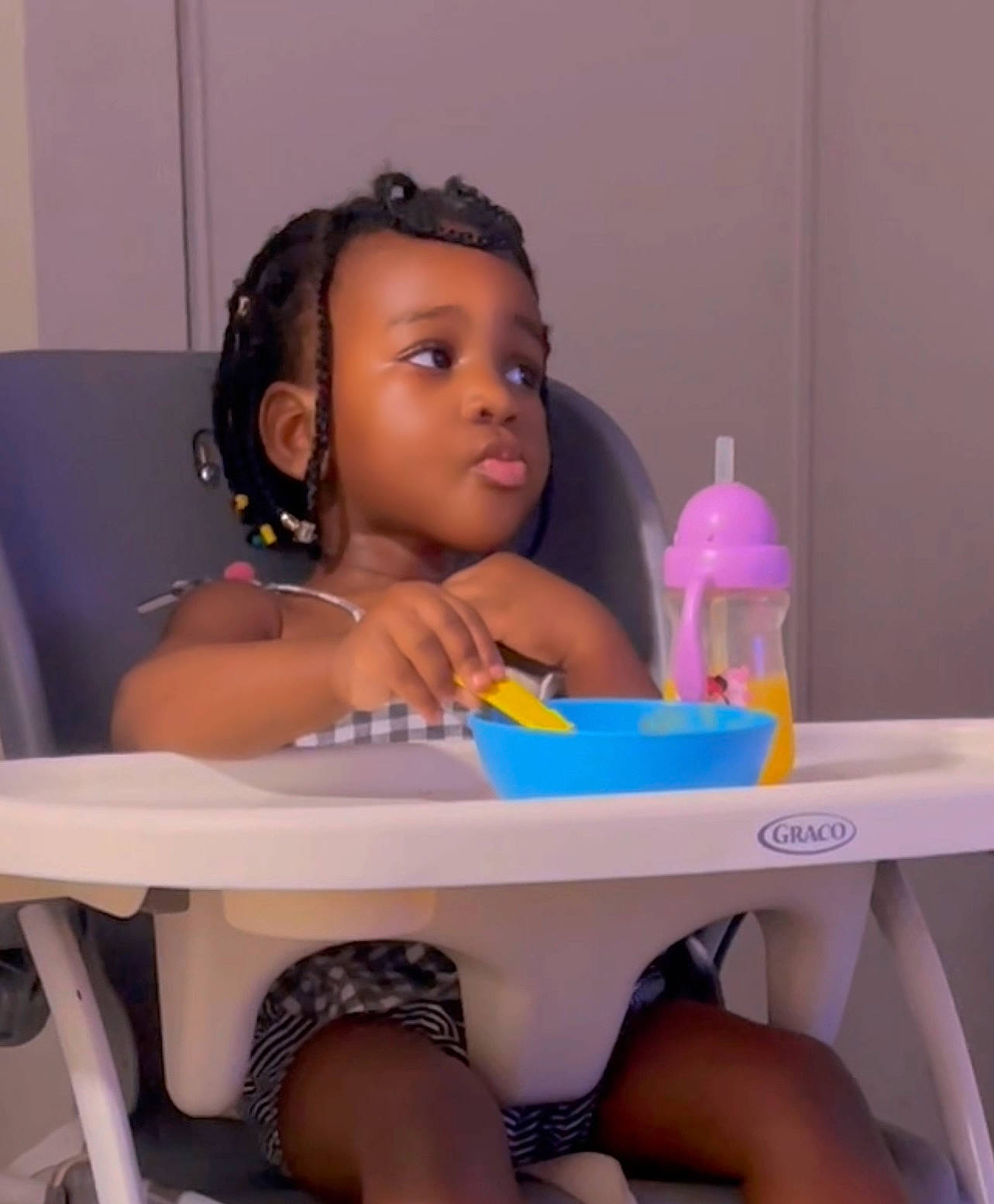 Shannel is registered to the contest to win money with this photo: baby_toddler_clothing, beauty, black_hair, chair, child, eyelash, fun, hair, hairstyle, happy, human_leg, leisure, nail, person, plastic, plastic_bottle, skin, table, thigh, toddler