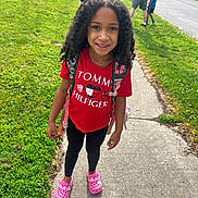 Khrystlyn joined the competition — help win amazing prizes! child, girl, smiling, portrait, outdoors, sidewalk, grass, neighborhood, backpack, red_shirt, pink_shoes, curly_hair, standing, sunny, family, children, street, house, vehicle, fashion