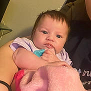 Sabrina joined the competition — help win amazing prizes! adult_partial, arm, baby, blanket, caretaker, child, clothing, cozy, cuddling, eyes, face, hair, hand, indoor, infant, plush_toy, portrait, skin, sleeve, sofa