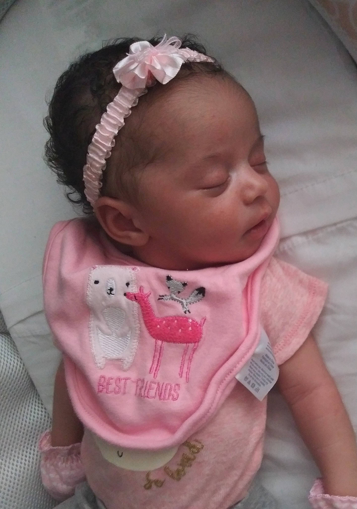 Lilyana is registered to the contest to win money with this photo: baby, baby_toddler_clothing, cheek, child, face, fashion_accessory, forehead, hair_accessory, head, headband, headgear, headpiece, neck, person, pink, skin, toddler