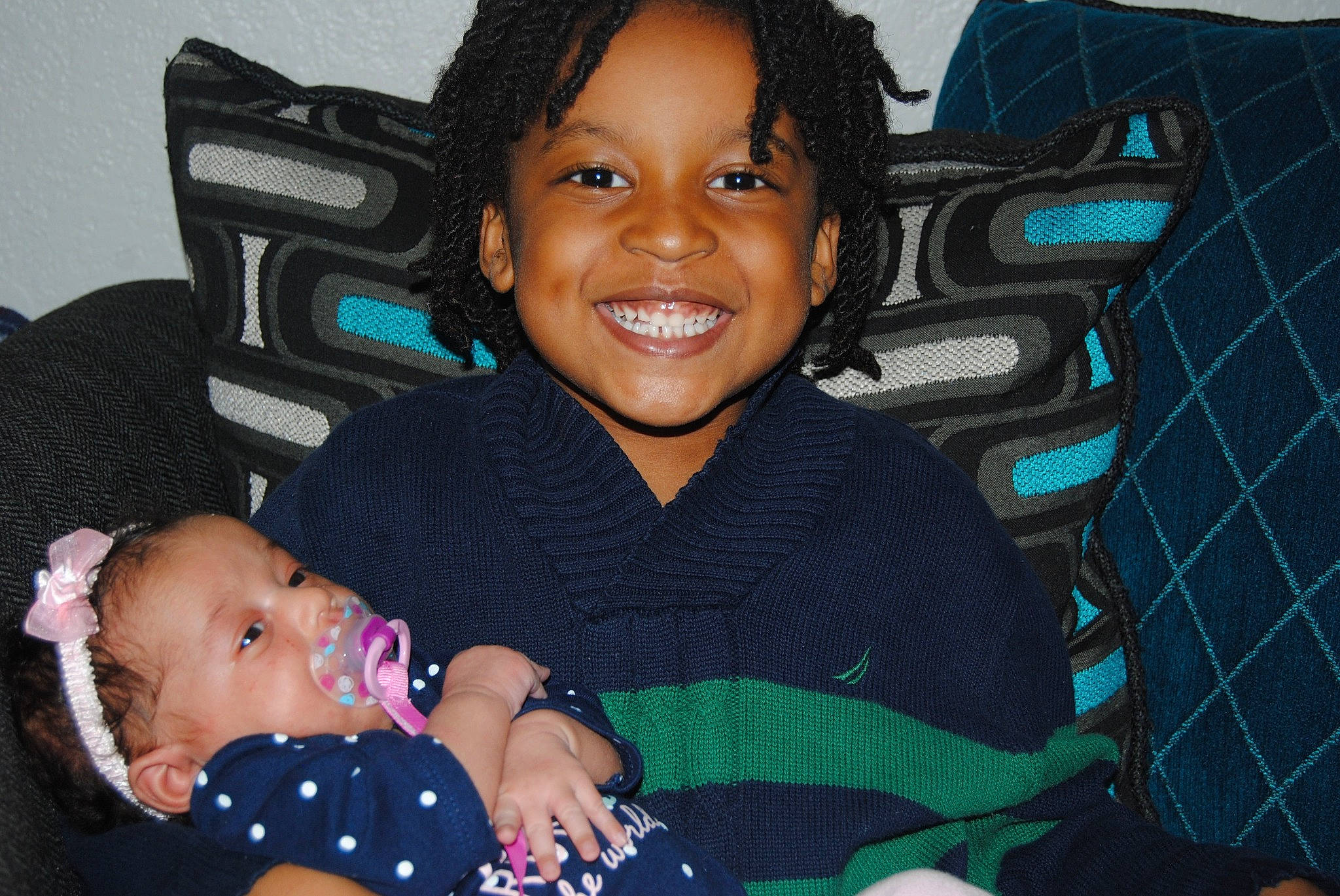 Iy'Kease joined the competition — help win amazing prizes! baby, black_hair, cheek, child, family, fun, happy, iris, joy, people, person, sibling, sitting, smile, toddler