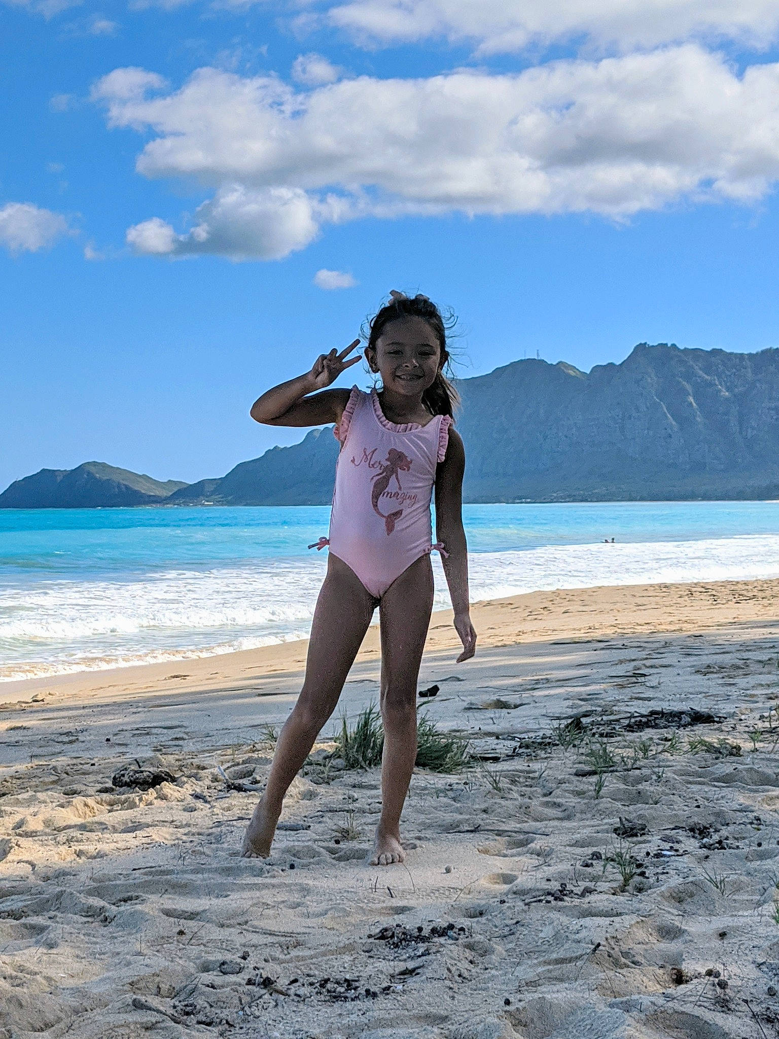 Milah is registered to the contest to win money with this photo: beach, cloud, coast, coastal_and_oceanic_landforms, fun, happy, joy, leg, long_hair, ocean, person, photography, sand, sea, shore, sky, summer, tourism, tropics, vacation