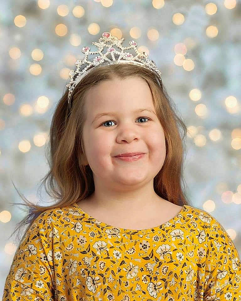 Nova joined the competition — help win amazing prizes! blond, child, child_model, crown, dress, fashion_accessory, hair, hair_accessory, hairstyle, happy, headband, headgear, headpiece, joy, pattern, person, smile, tiara, yellow