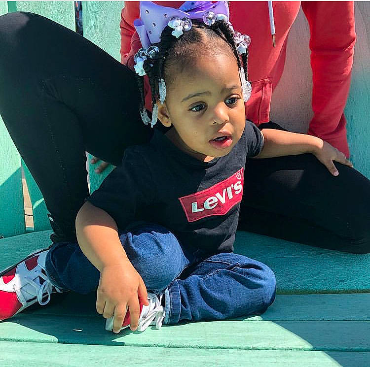 Delilah joined the competition — help win amazing prizes! arm, black_hair, cool, elbow, facial_expression, flooring, fun, hairstyle, happy, head, joint, knee, lap, leg, leisure, person, recreation, shoe, sleeve, sneakers