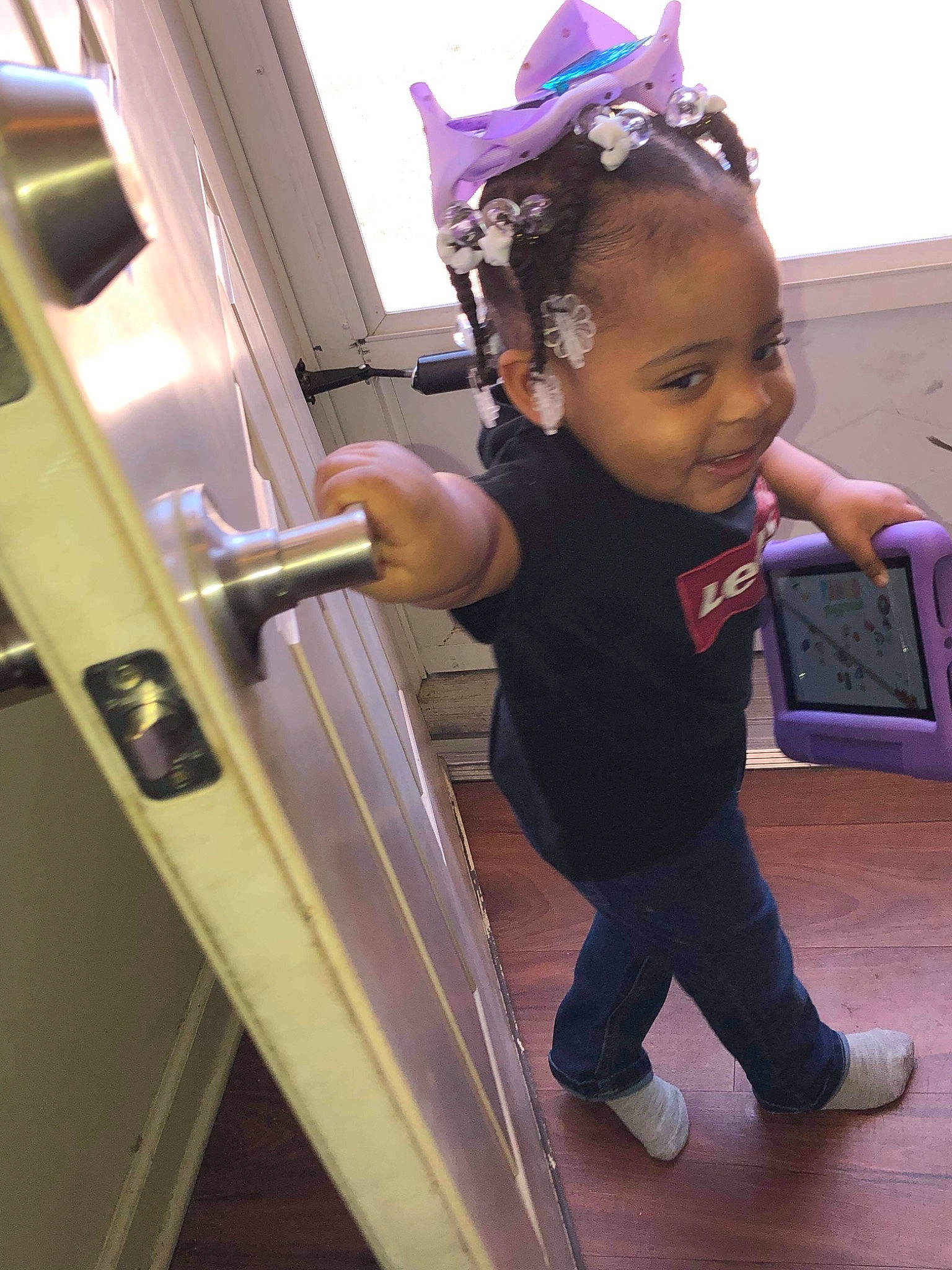 Delilah joined the competition — help win amazing prizes! baby, baby_toddler_clothing, box, child, fashion_accessory, fun, happy, headpiece, jewellery, magenta, person, purple, sleeve, smile, stairs, t_shirt, toddler