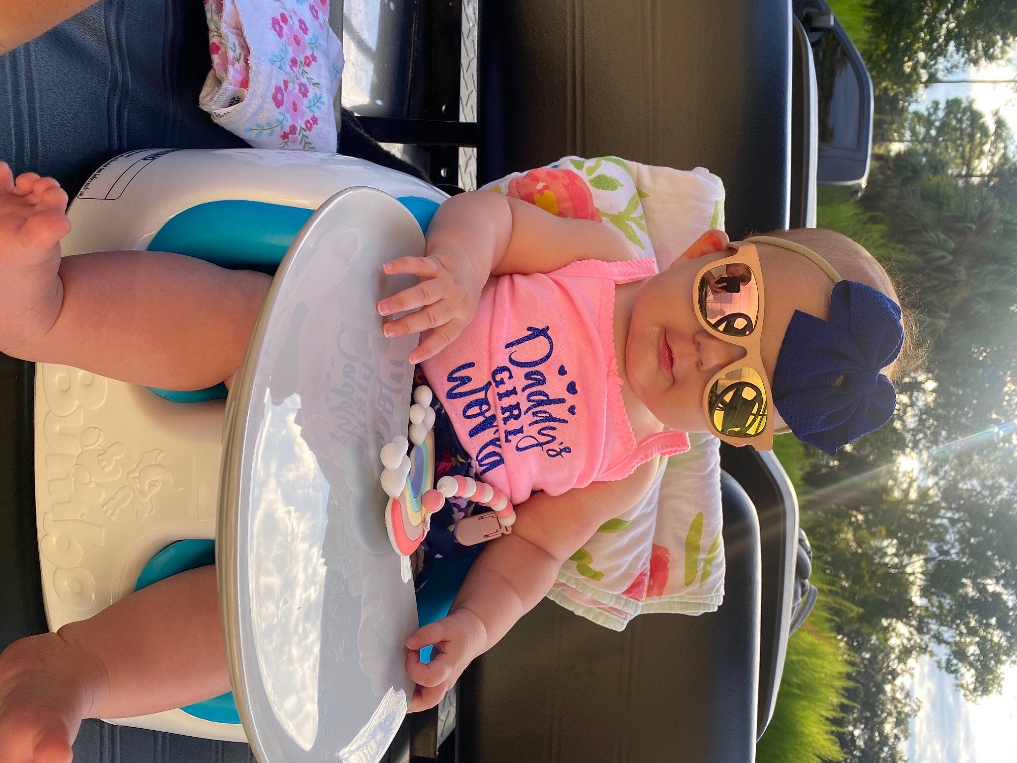 Skylar is registered to the contest to win money with this photo: chest, cool, elbow, event, finger, fun, gesture, hairstyle, happy, human_leg, knee, leisure, mouth, person, pink, recreation, snapshot, summer, thigh, tree