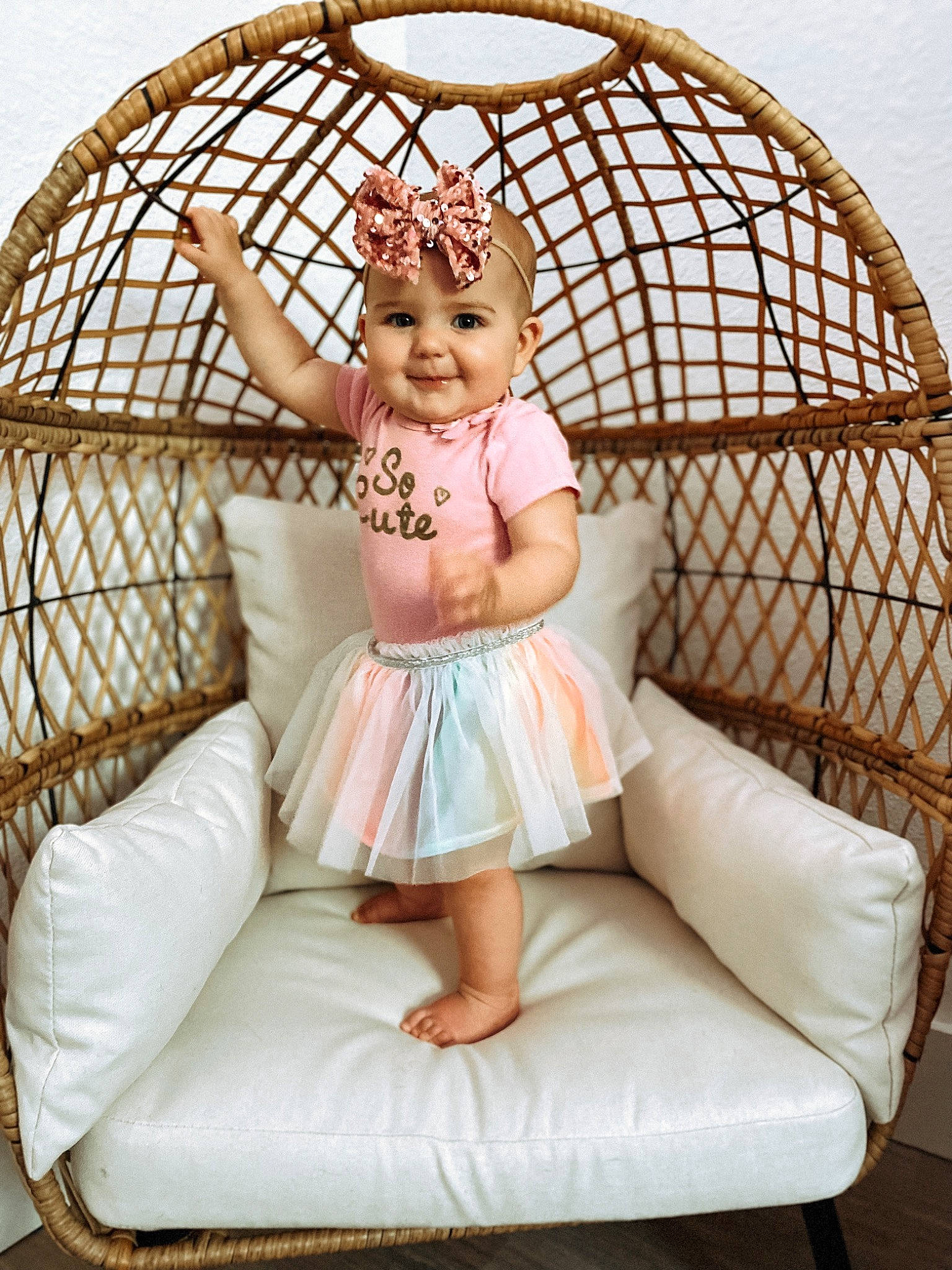 Skylar joined the competition — help win amazing prizes! baby_toddler_clothing, comfort, day_dress, dress, embellishment, face, flash_photography, hairstyle, happy, headwear, joy, pattern, person, pink, product, sitting, skin, sleeve, smile, textile