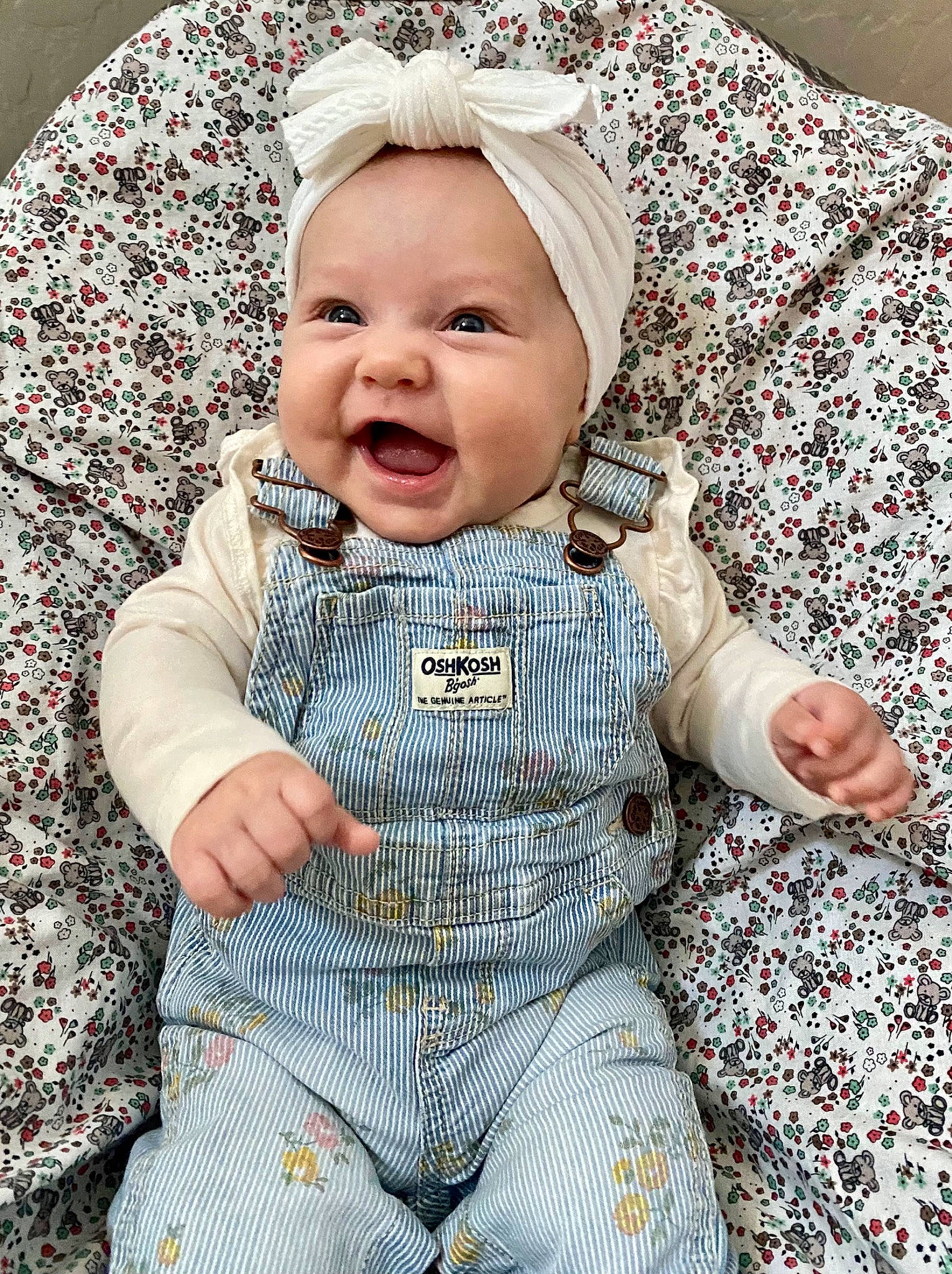 Addisyn joined the competition — help win amazing prizes! baby, baby_toddler_clothing, cap, cheek, collar, dress, eye, face, grass, happy, head, human_body, jacket, outerwear, person, product, skin, sleeve, smile, textile