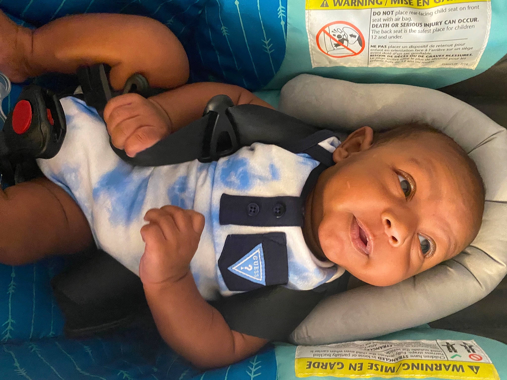 Gregory joined the competition — help win amazing prizes! baby, baby_toddler_clothing, blue, cheek, child, comfort, elbow, finger, fun, gesture, happy, human_body, knee, mouth, person, product, smile, t_shirt, thigh, thumb