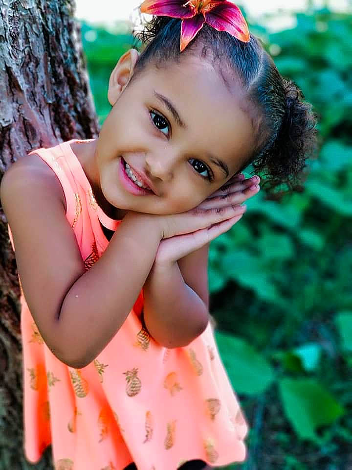 Lilyanna is registered to the contest to win money with this photo: beauty, child, child_model, eye, face, hair, hair_accessory, hairstyle, headband, headgear, joy, lip, long_hair, person, photo_shoot, photography, pink, plant, portrait_photography, skin