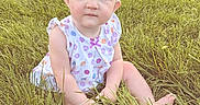 Stella joined the competition — help win amazing prizes! baby, child, cute, dress, face, grass, green, headband, house, lawn, nature, outdoor, person, polka_dot, portrait, sitting, summer, sunlight, yard, young