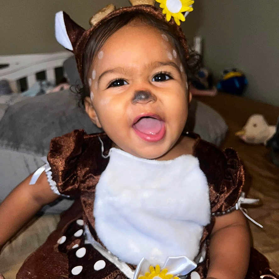 Alaya joined the competition — help win amazing prizes! baby, bodypart, clothing, costume, cream, dessert, dress, face, finger, food, hand, happy, hat, head, icing, laughing, person, photography, portrait, smile