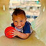 Brave joined the competition — help win amazing prizes! child, toddler, boy, smiling, basketball, ball, portrait, indoor, playground, tunnel, playful, happy, sitting, lying_down, short_hair, blue_shirt, orange_ball, warm_lighting, close_up, recreation