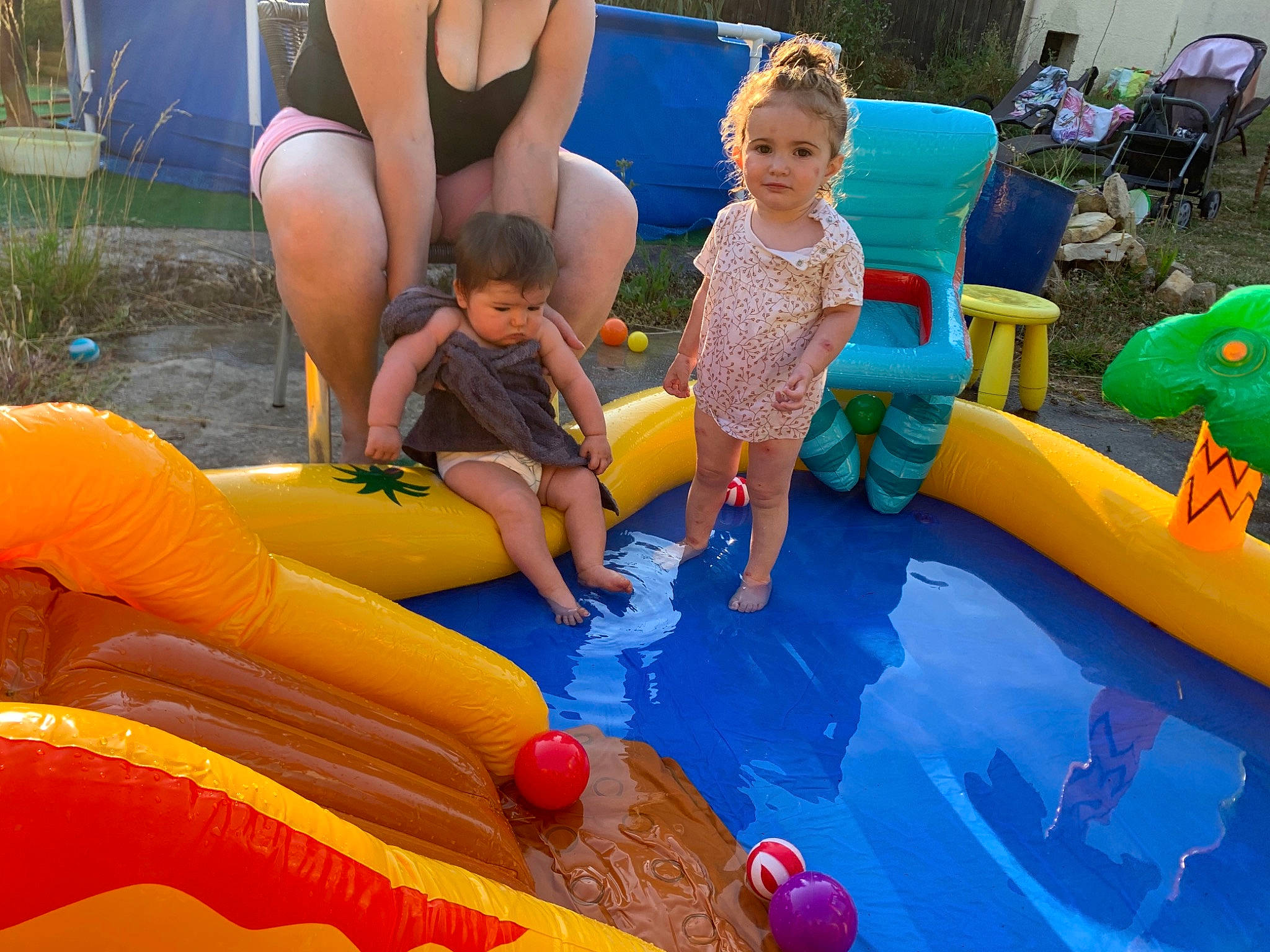 Lolena participe au concours pour gagner de l'argent avec cette photo : aqua, blue, child, fun, games, green, inflatable, leisure, outdoor_play_equipment, outdoor_recreation, people, person, photograph, playground, public_space, recreation, shorts, snapshot, summer, toddler