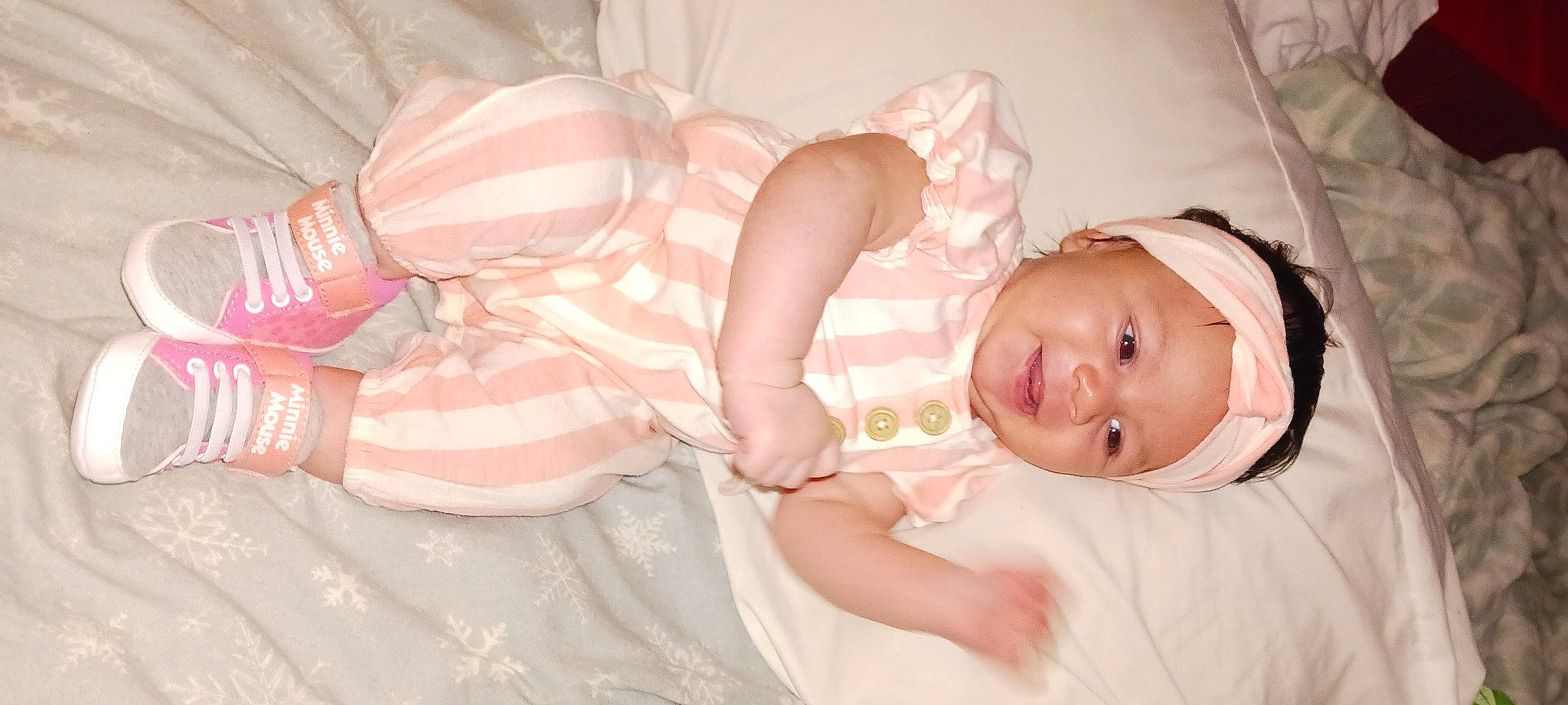 Faithlyn is registered to the contest to win money with this photo: arm, baby, baby_toddler_clothing, cheek, child, comfort, dress, eyelash, finger, hand, hat, headgear, headwear, human_body, iris, mouth, nail, person, pink, skin