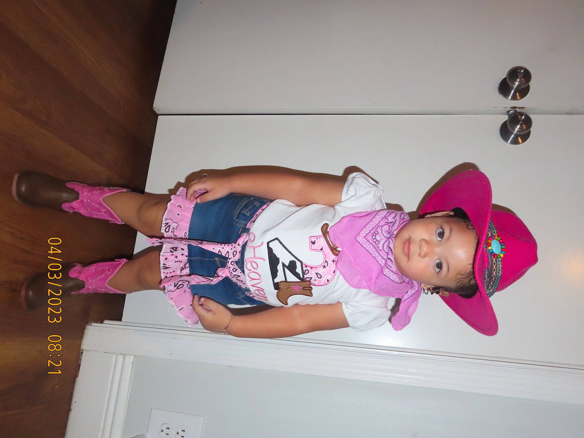 Heaven is registered to the contest to win money with this photo: baby_toddler_clothing, fun, hat, headwear, human_leg, knee, leisure, magenta, person, pink, room, sandal, thigh, toddler, wrist