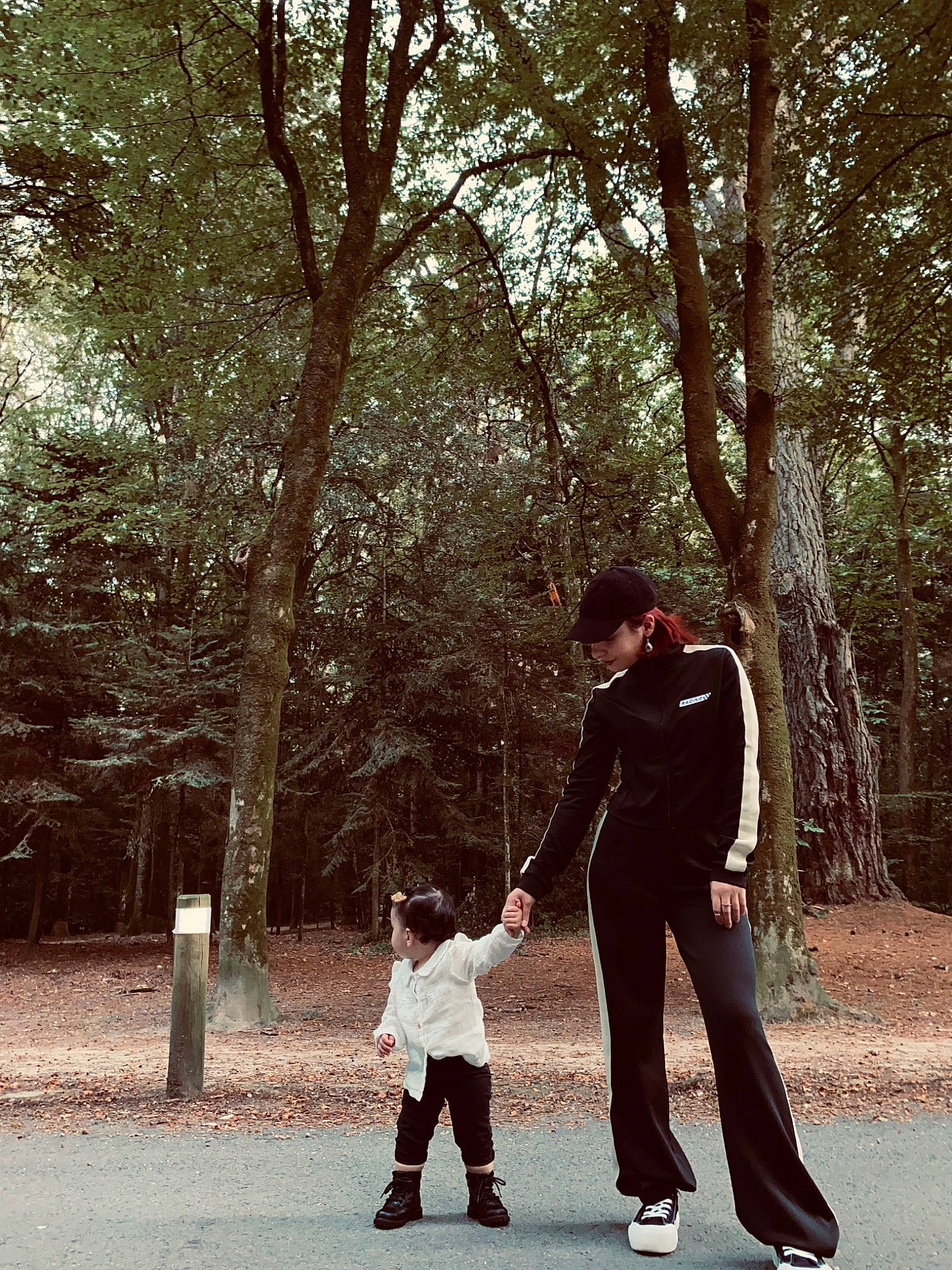 Ada participe au concours pour gagner de l'argent avec cette photo : forest, fun, gesture, happy, holding_hands, leisure, love, monochrome, monochrome_photography, people_in_nature, person, plant, recreation, standing, stock_photography, suit, tints_and_shades, toddler, tree, walking