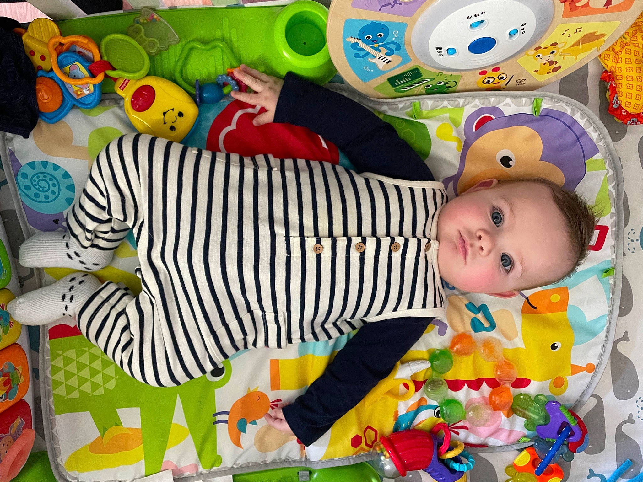 Sean is registered to the contest to win money with this photo: art, baby, baby_products, baby_toddler_clothing, baby_toys, child, fun, happy, hat, linens, pattern, person, plastic, play, product, room, smile, textile, toddler, toy