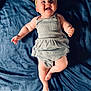 Merclynn joined the competition — help win amazing prizes! baby, child, smiling, headband, bow, romper, gray_clothing, lying_down, blue_blanket, happy, infant, cheerful, cute, skin, barefoot, indoors, portrait, person, young_child, baby_girl