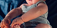 Merclynn is registered to the contest to win money with this photo: adorable, baby, baby_pose, blue_eyes, child, chubby_cheeks, close_up, cute, grabbing_toes, grey_outfit, headband, human, indoor, infant, infant_clothing, person, portrait, skin, soft_background, yellow_headband