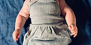 Merclynn joined the competition — help win amazing prizes! baby, infant, child, smiling, laughing, headband, yellow, clothing, grey, blanket, blue, skin, barefoot, cute, happy, portrait, lying_down, indoors, human, person