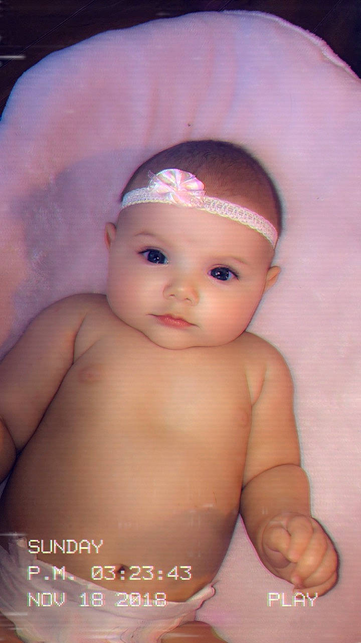 Kinsley is registered to the contest to win money with this photo: cheek, child, eye, forehead, girl, head, infant, iris, lip, person, product, skin, toddler