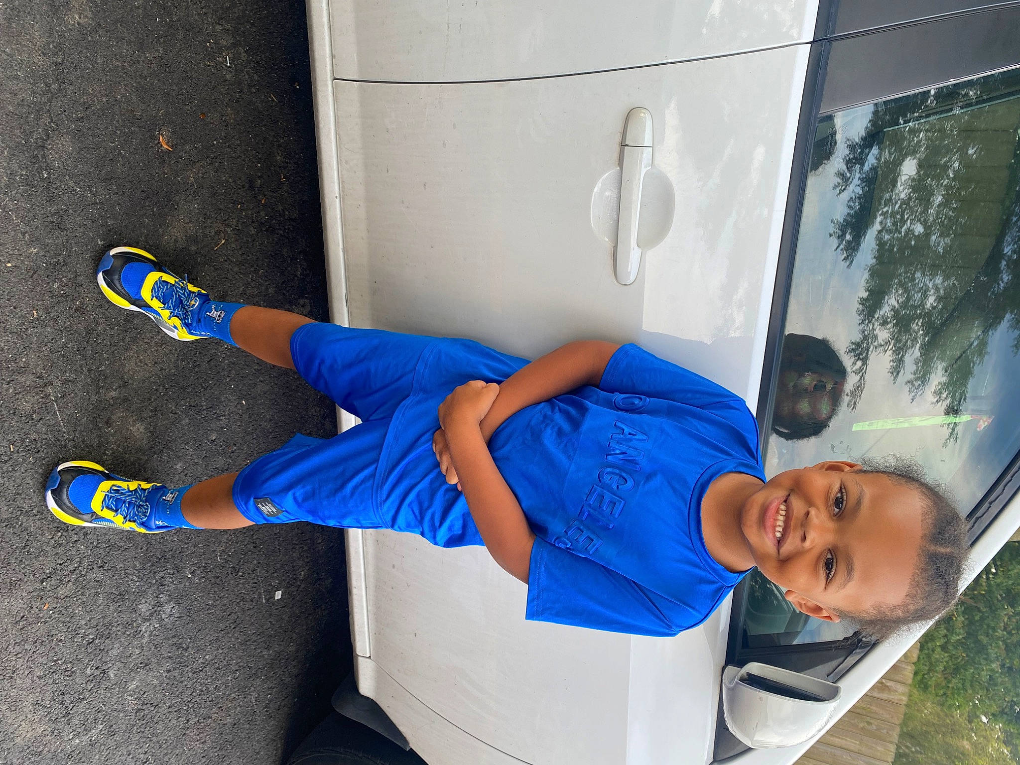Carter joined the competition — help win amazing prizes! automotive_exterior, elbow, electric_blue, fun, hat, human_leg, joy, knee, leisure, motor_vehicle, person, shorts, smile, soccer, sock, sports_equipment, sportswear, t_shirt, thigh, tire