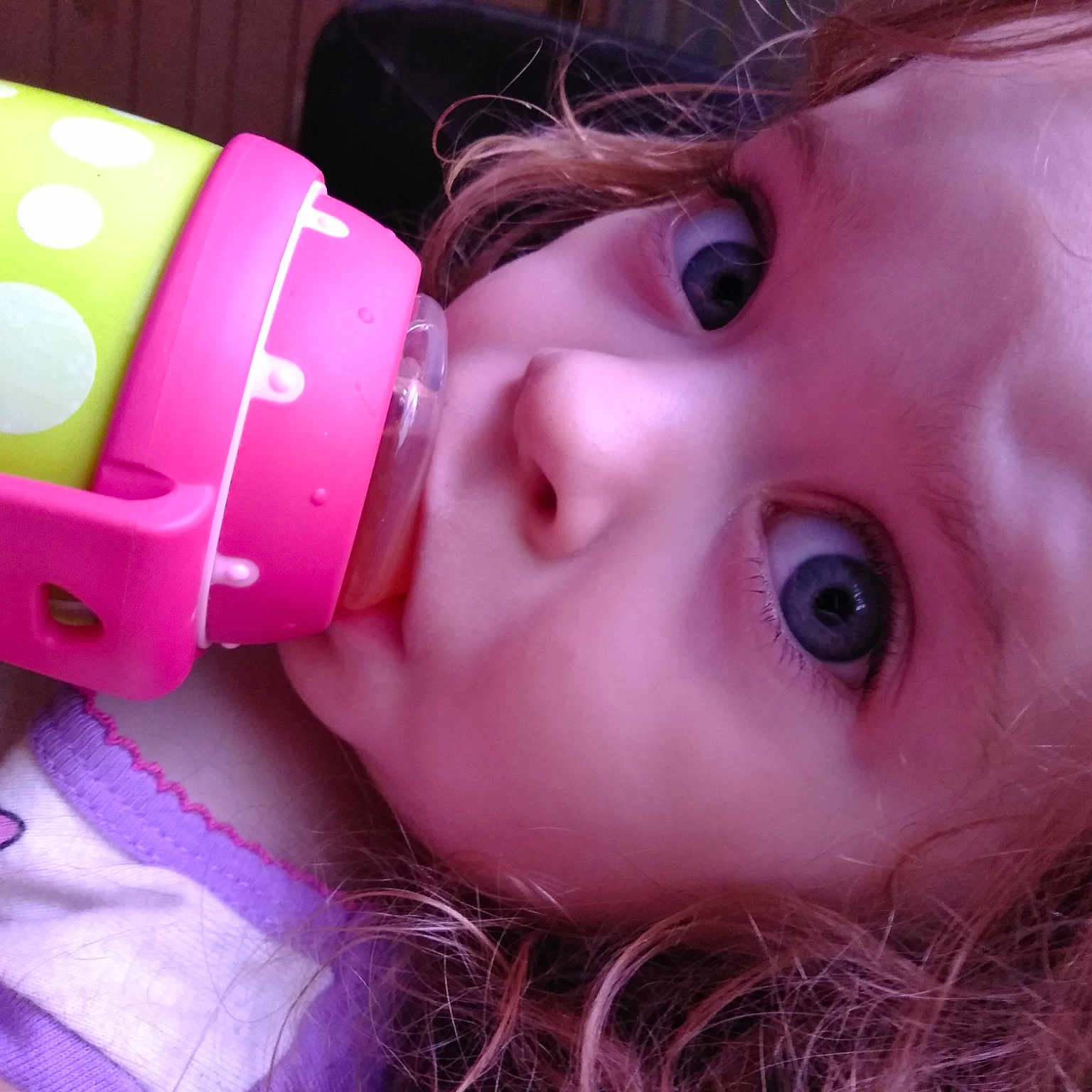 Lala is registered to the contest to win money with this photo: cheek, child, close_up, ear, eye, face, forehead, girl, head, infant, iris, lip, mouth, nose, organ, pink, product, skin, smile, toddler