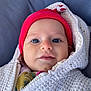 Gaspar participe au concours pour gagner de l'argent avec cette photo : baby, infant, face, red_hat, knitted_jacket, blue_eyes, close_up, portrait, warm_clothing, cozy, child, cute, young, outdoor, winter_wear, soft_texture, expression, looking_at_camera, headwear, smiling