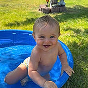 Caysen is registered to the contest to win money with this photo: toddler, child, pool, water, smiling, outdoor, grass, sunlight, summer, diaper, happy, baby, blue, tree, nature, play, fun, skin, person, daytime