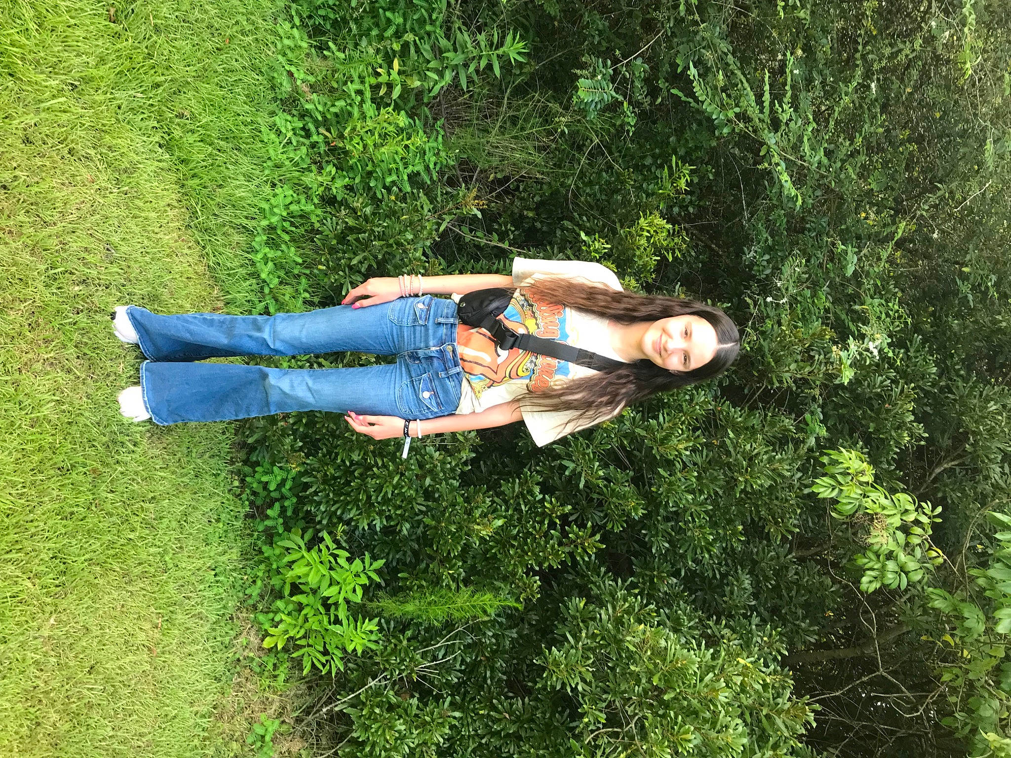 Angelina is registered to the contest to win money with this photo: electric_blue, fun, garden, grass, grass_family, grassland, happy, joy, landscape, leisure, natural_landscape, people_in_nature, person, plant, recreation, shrub, t_shirt, tree