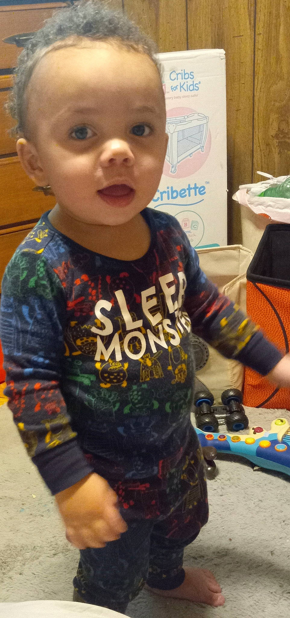 Isiah is registered to the contest to win money with this photo: baby, baby_toddler_clothing, cheek, child, cool, electric_blue, face, fun, happy, head, nose, pattern, person, play, recreation, sitting, sleeve, snapshot, t_shirt, toddler