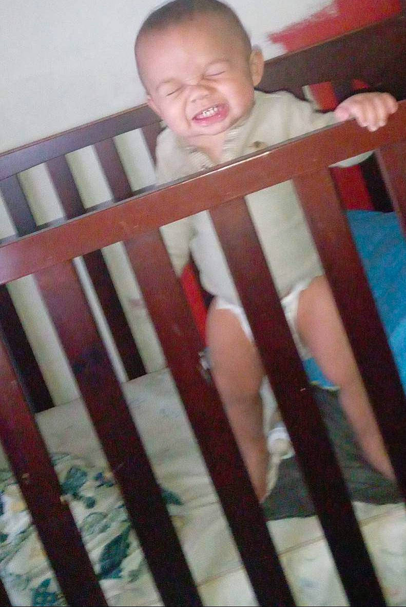 Isiah joined the competition — help win amazing prizes! baby, baby_products, baby_safety, baby_toddler_clothing, bed, child, comfort, cradle, fence, hardwood, infant_bed, nursery, pattern, person, room, sleeve, smile, t_shirt, thumb, toddler