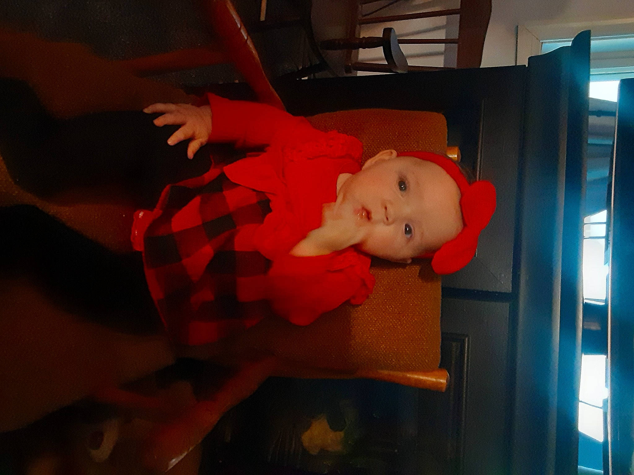 Jolene joined the competition — help win amazing prizes! baby, carmine, child, comfort, event, fictional_character, flooring, fun, hat, headwear, holiday, lap, machine, orange, pattern, person, plaid, room, smile, tartan