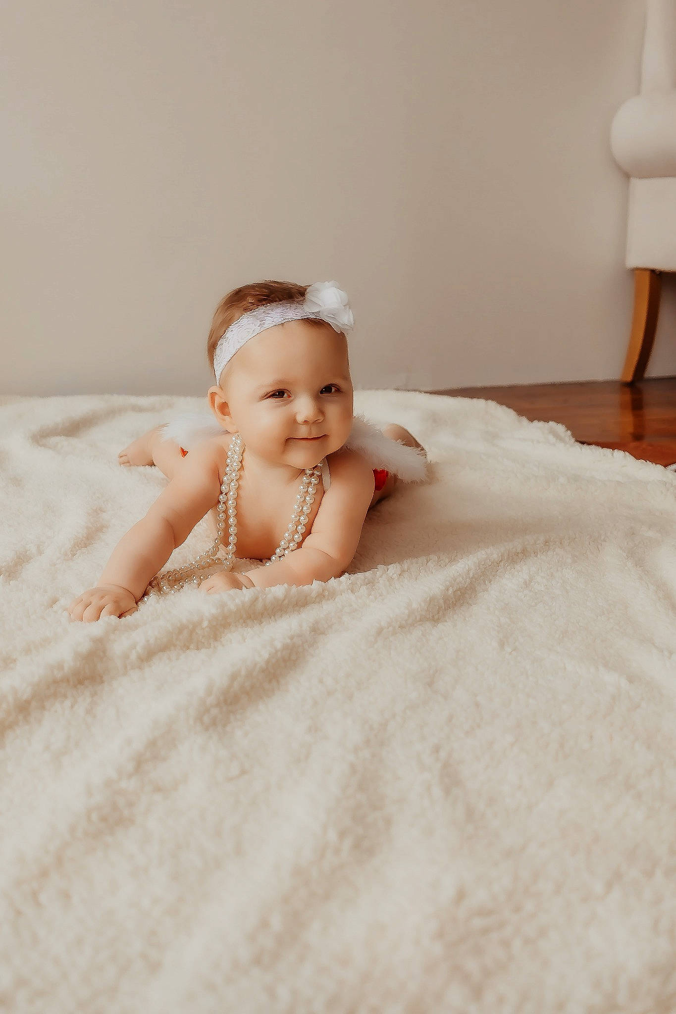 Jolene is registered to the contest to win money with this photo: baby, bathing, beauty, bedding, blond, bridal_accessory, comfort, event, fashion_accessory, flash_photography, floor, flooring, hairstyle, happy, headpiece, joy, linens, person, shoulder, skin