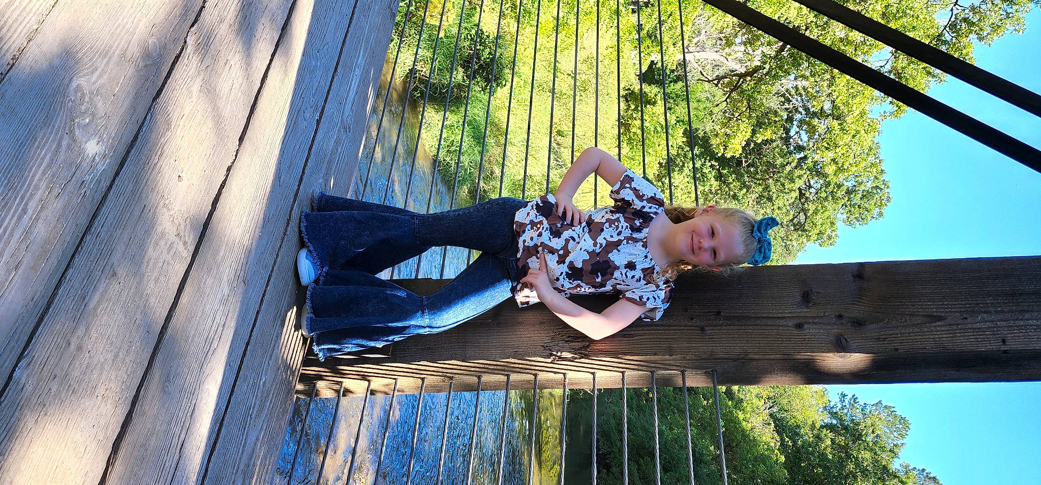 Genessa joined the competition — help win amazing prizes! blue, electric_blue, flash_photography, fun, grass, happy, human_leg, joy, leisure, people_in_nature, person, plant, sitting, sky, thigh, tints_and_shades, tree, wood