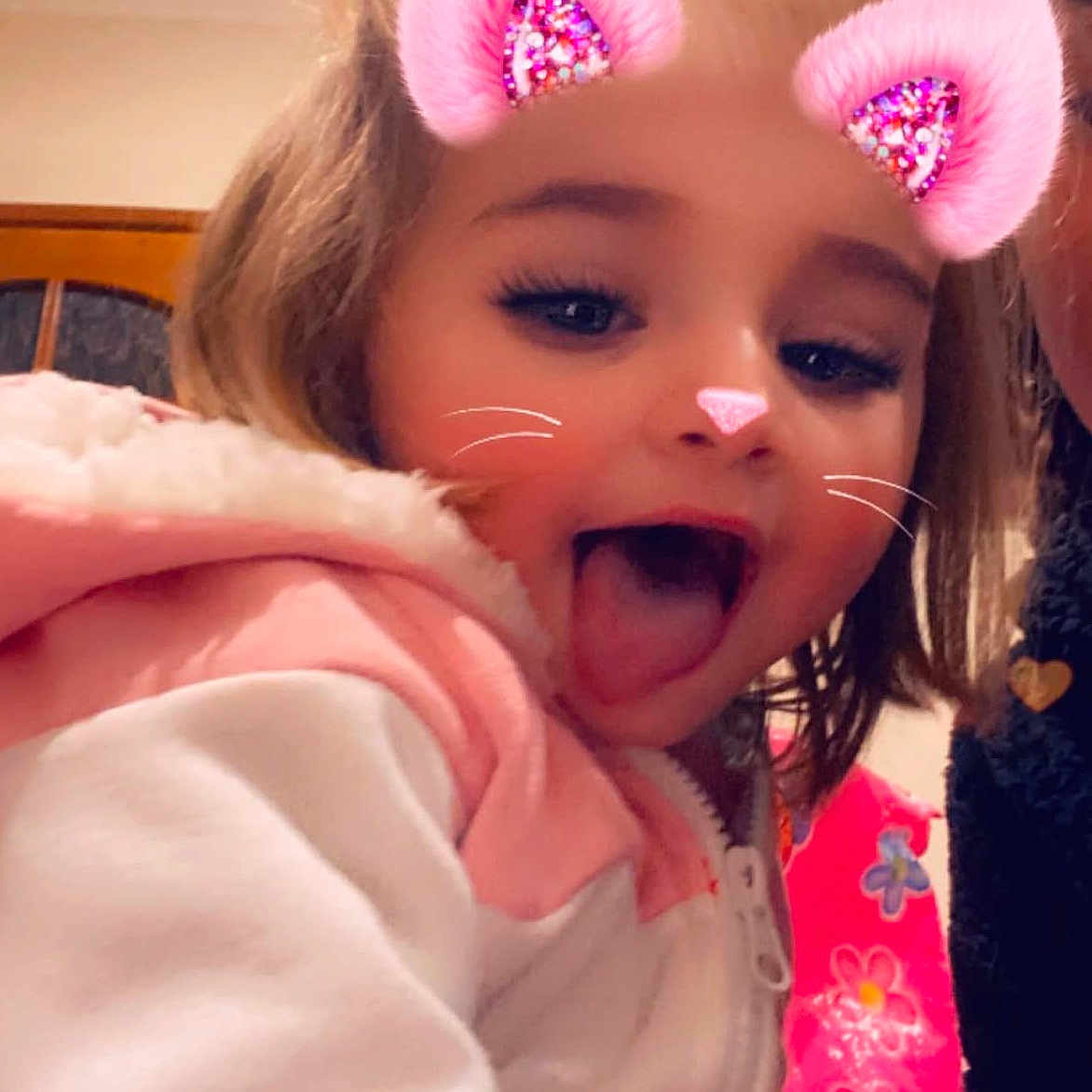 Jaylah is registered to the contest to win money with this photo: baby, babylaughing, child, clothing, coat, cosmetics, dress, face, female, flower, girl, happy, head, jacket, lipstick, person, petal, photography, plant, portrait